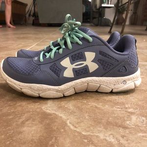 Under armor tennis shoes. Color is  a purple/gray